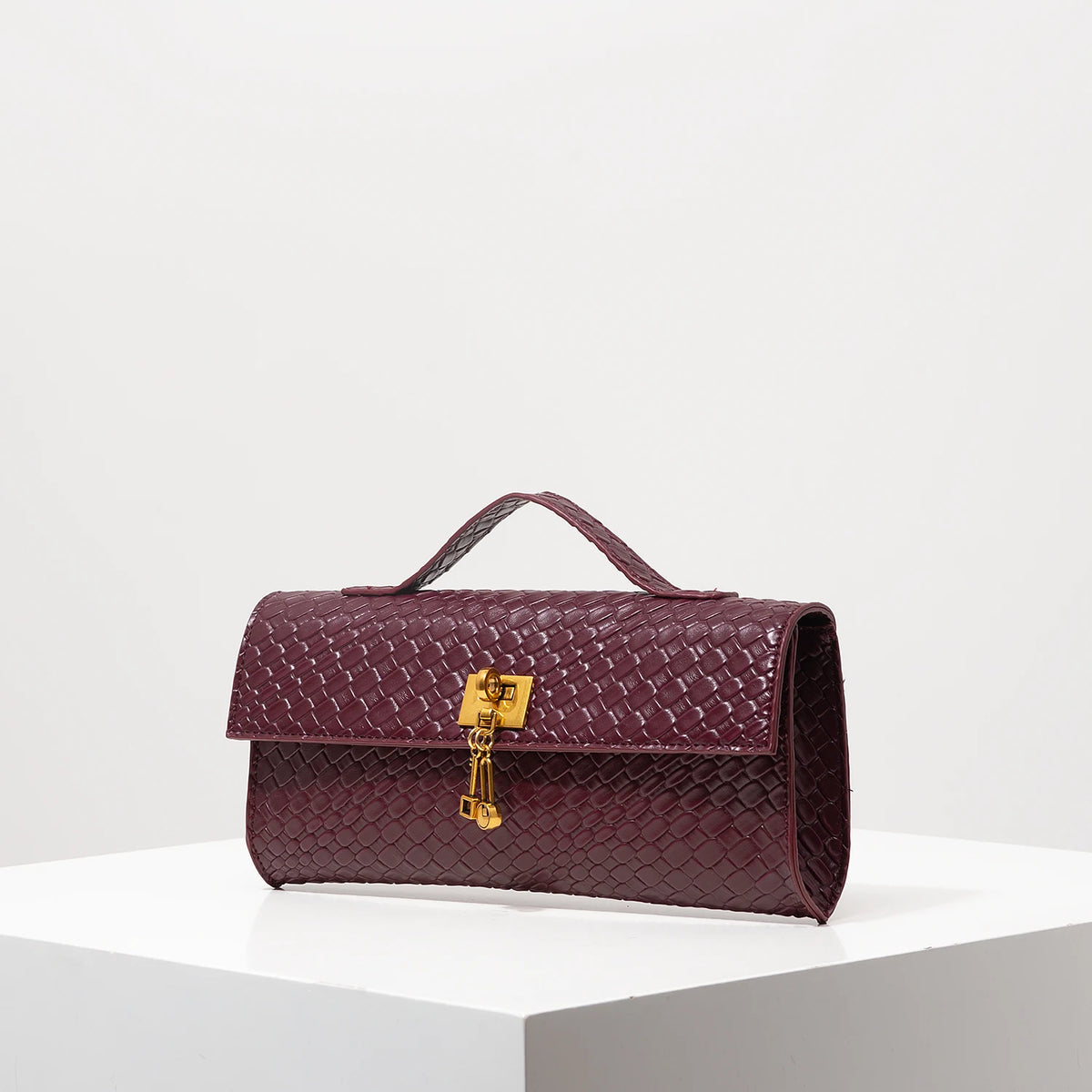Gia Woven Top Handle Clutch Bag