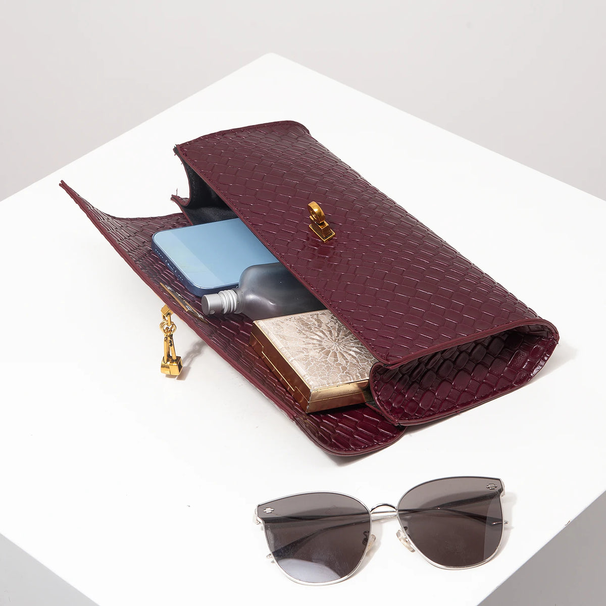 Gia Woven Top Handle Clutch Bag